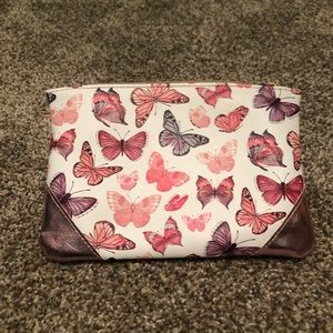 Butterfly cosmetic clutch